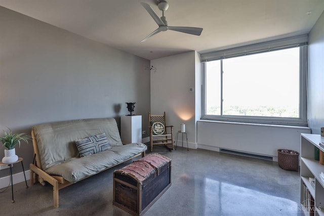2401 Ingleside Ave Unit 10D, Cincinnati, OH 45206 - sitting room with finished concrete flooring, a ceiling fan, and baseboards