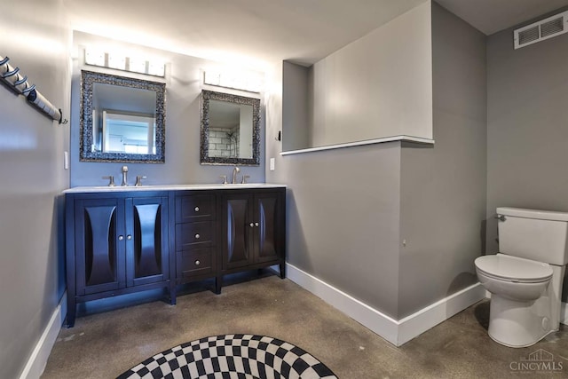 2401 Ingleside Ave Unit 10D, Cincinnati, OH 45206 - full bath with baseboards, toilet, double vanity, and concrete flooring