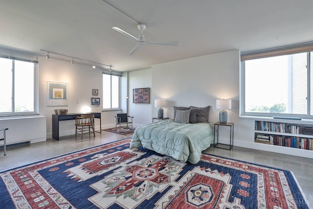 2401 Ingleside Ave Unit 10D, Cincinnati, OH 45206 - bedroom featuring rail lighting, baseboards, and ceiling fan
