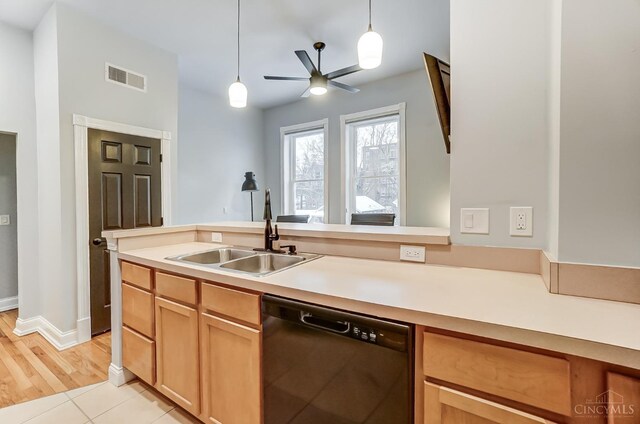 2110 Fulton Ave Unit 3, Cincinnati, OH 45206 - kitchen with dishwasher, a sink, pendant lighting, light countertops, and ceiling fan