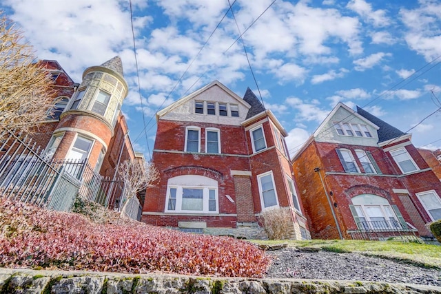 2110 Fulton Ave Unit 3, Cincinnati, OH 45206 - victorian house featuring brick siding