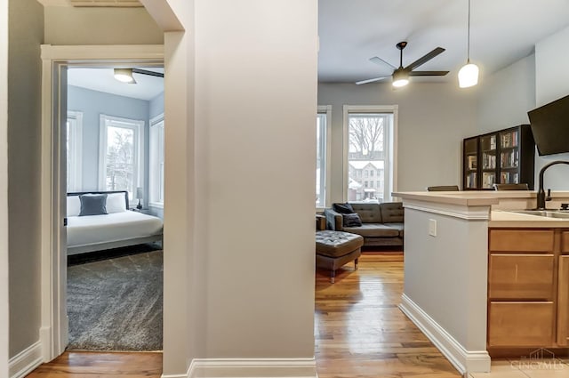 2110 Fulton Ave Unit 3, Cincinnati, OH 45206 - hall featuring light wood-type flooring and a sink