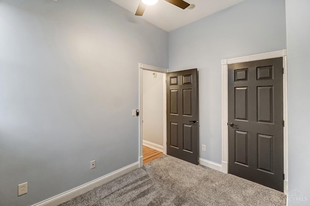 2110 Fulton Ave Unit 3, Cincinnati, OH 45206 - unfurnished bedroom with carpet floors, a high ceiling, baseboards, and a ceiling fan