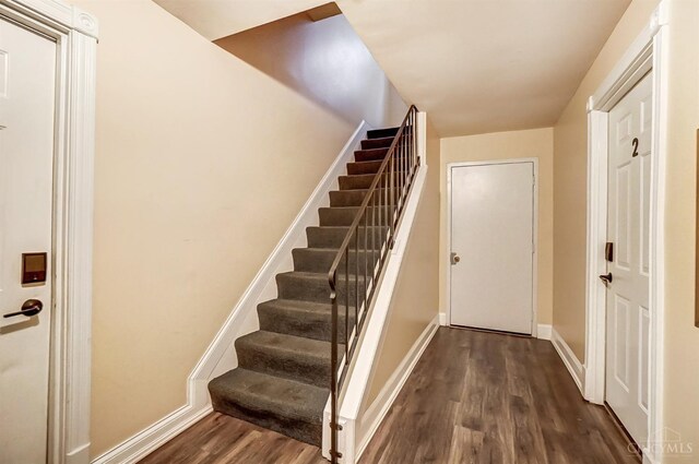 2110 Fulton Ave Unit 3, Cincinnati, OH 45206 - stairway featuring wood finished floors and baseboards