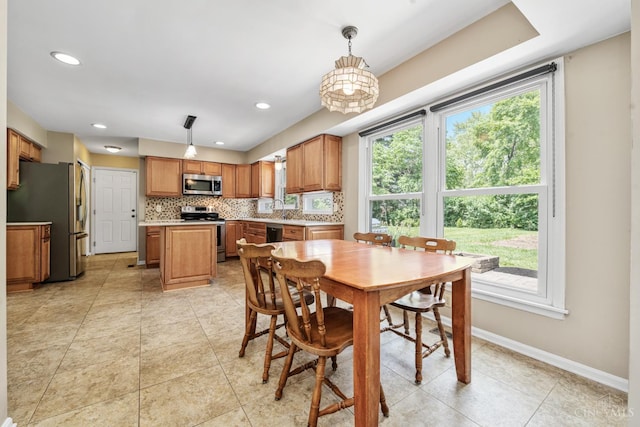 8912 Chapelsquare Ln, Symmes Twp, OH 45249 - dining room with baseboards, recessed lighting, and light tile patterned floors