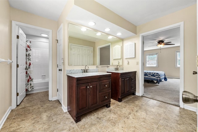 8912 Chapelsquare Ln, Symmes Twp, OH 45249 - full bathroom with double vanity, recessed lighting, baseboards, and shower / bathtub combination with curtain