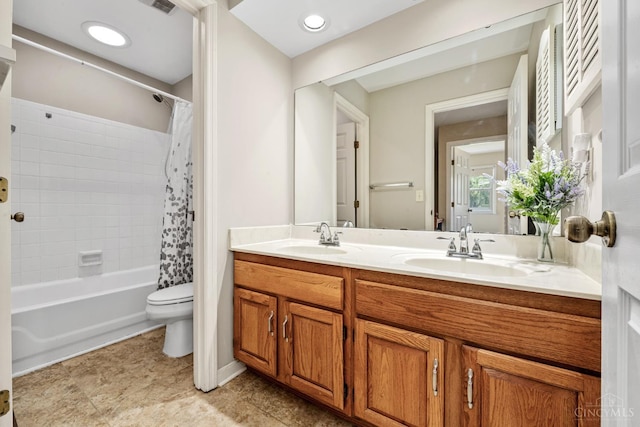 8912 Chapelsquare Ln, Symmes Twp, OH 45249 - bathroom featuring double vanity, toilet, and shower / bath combo with shower curtain