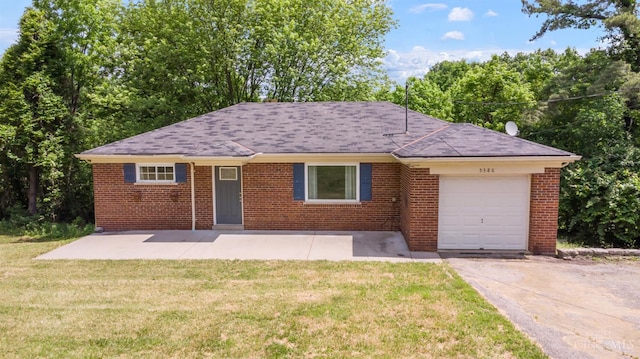 5386 Day Rd, Colerain Twp, OH 45251 - ranch-style home featuring driveway, an attached garage, a front yard, and brick siding