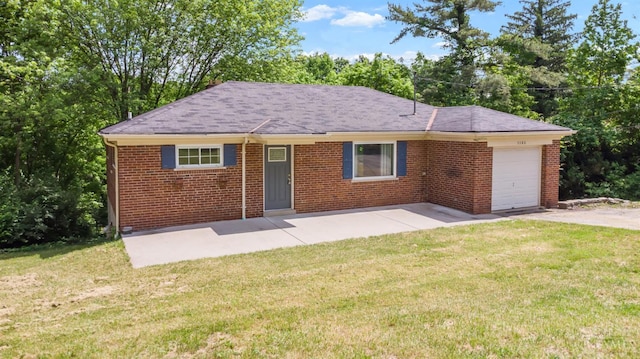 5386 Day Rd, Colerain Twp, OH 45251 - ranch-style home featuring an attached garage, a front yard, brick siding, and driveway