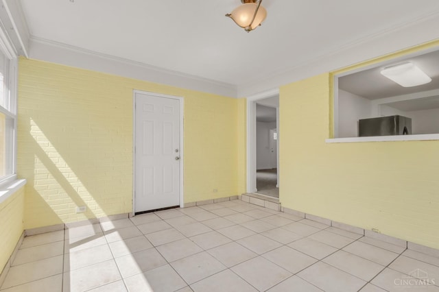 5386 Day Rd, Colerain Twp, OH 45251 - unfurnished room with light tile patterned floors, crown molding, and baseboards