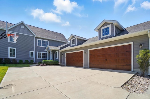 5757 W Fork Rd, Green Twp, OH 45247 - view of front of house featuring driveway, an attached garage, and a shingled roof