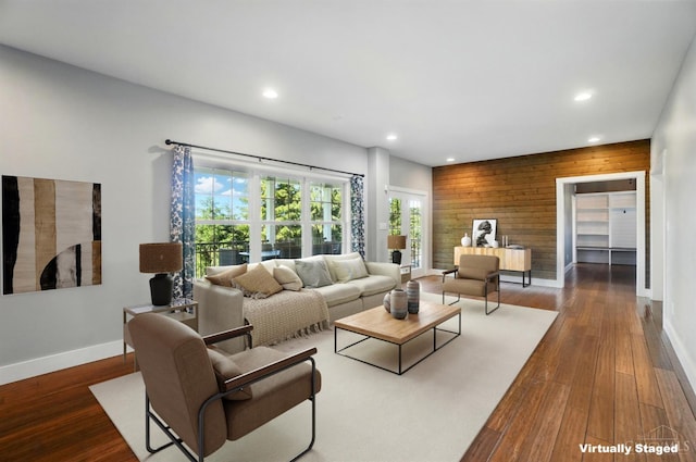 5757 W Fork Rd, Green Twp, OH 45247 - living room with recessed lighting, baseboards, wooden walls, wood finished floors, and an accent wall