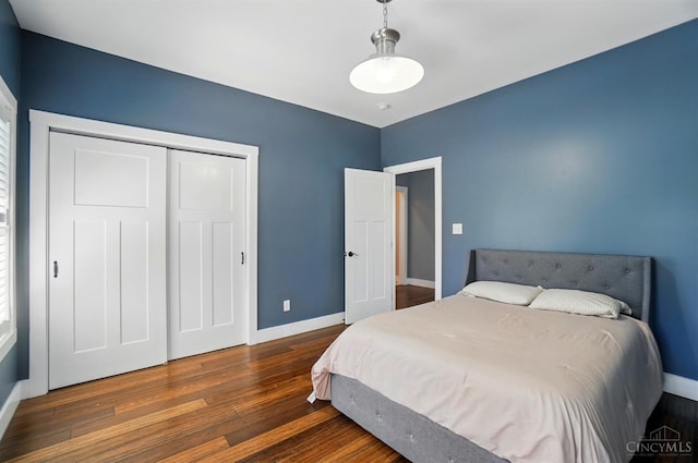 5757 W Fork Rd, Green Twp, OH 45247 - bedroom with wood finished floors, baseboards, and a closet