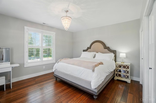 5757 W Fork Rd, Green Twp, OH 45247 - bedroom featuring baseboards, a chandelier, and wood-type flooring