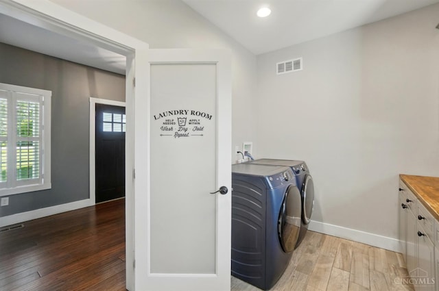 5757 W Fork Rd, Green Twp, OH 45247 - laundry room featuring independent washer and dryer, cabinet space, light wood-style floors, baseboards, and recessed lighting