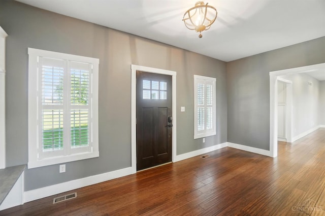 5757 W Fork Rd, Green Twp, OH 45247 - foyer entrance featuring plenty of natural light, wood finished floors, and baseboards