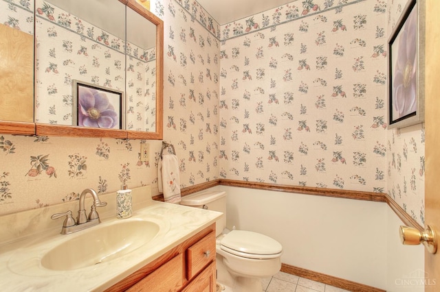 3169 John Gray Rd, Colerain Twp, OH 45251 - bathroom featuring wallpapered walls, toilet, vanity, and tile patterned floors