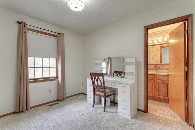 3169 John Gray Rd, Colerain Twp, OH 45251 - home office with light carpet, a textured ceiling, and baseboards