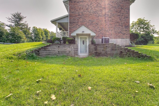 3169 John Gray Rd, Colerain Twp, OH 45251 - view of front of property with brick siding, a front yard, and stairs