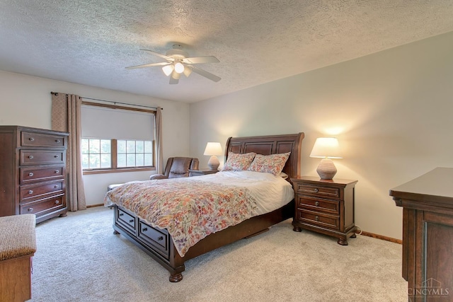 3169 John Gray Rd, Colerain Twp, OH 45251 - bedroom with light carpet, baseboards, a textured ceiling, and a ceiling fan