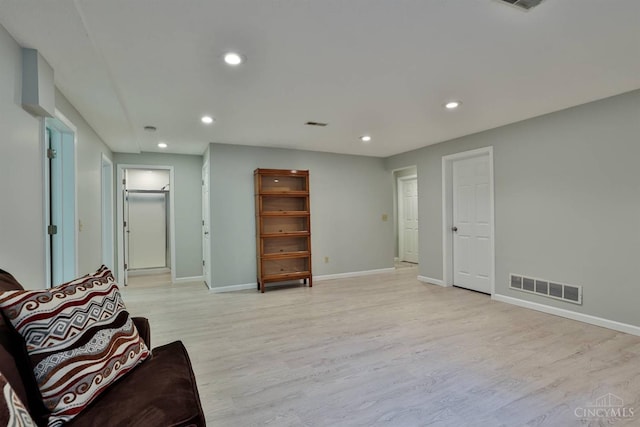 8750 E Kemper Rd, Symmes Twp, OH 45249 - living area featuring light wood-style flooring, recessed lighting, and baseboards
