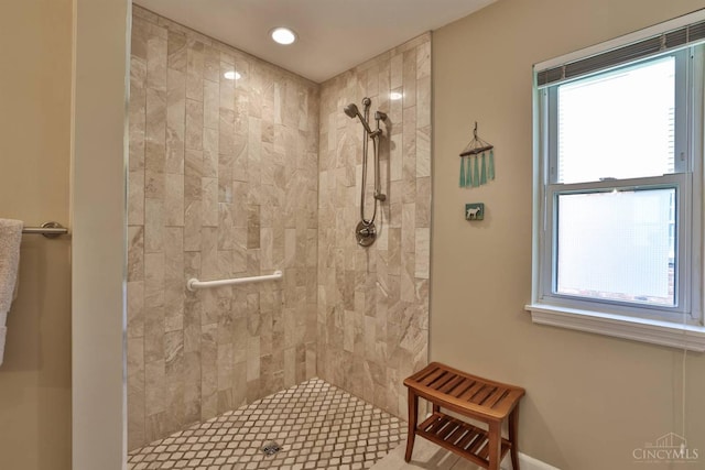 8750 E Kemper Rd, Symmes Twp, OH 45249 - bathroom with a tile shower and recessed lighting