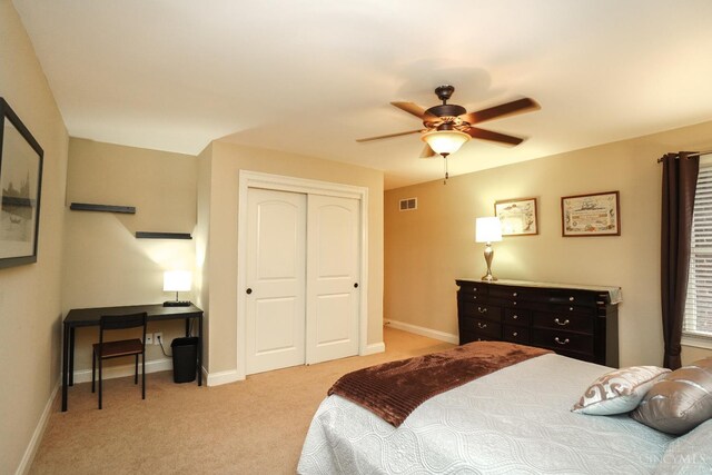 4625 Guildford Dr, West Chester, OH 45069 - carpeted bedroom featuring a closet, baseboards, and ceiling fan