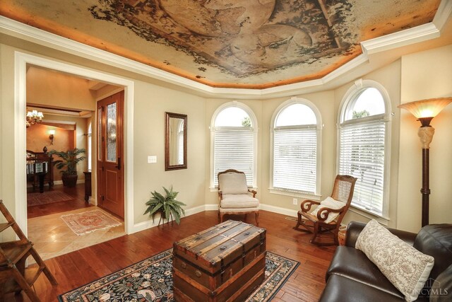 4625 Guildford Dr, West Chester, OH 45069 - living area featuring a tray ceiling, healthy amount of natural light, wood-type flooring, and crown molding