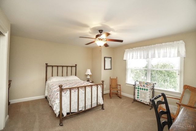 4625 Guildford Dr, West Chester, OH 45069 - bedroom with carpet flooring, baseboards, and a ceiling fan