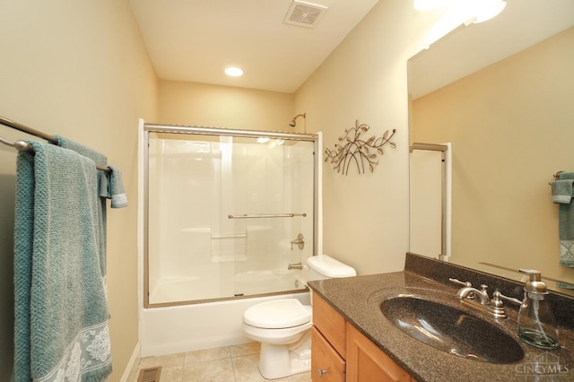 4625 Guildford Dr, West Chester, OH 45069 - full bath with vanity, toilet, combined bath / shower with glass door, and tile patterned floors