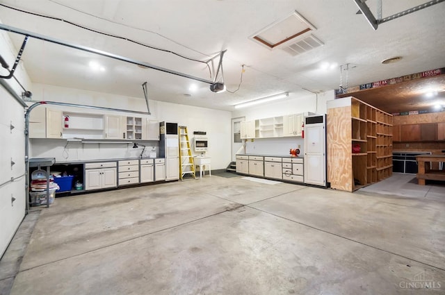 2193 Phillips Rd, Union Twp, OH 45036 - garage with a garage door opener