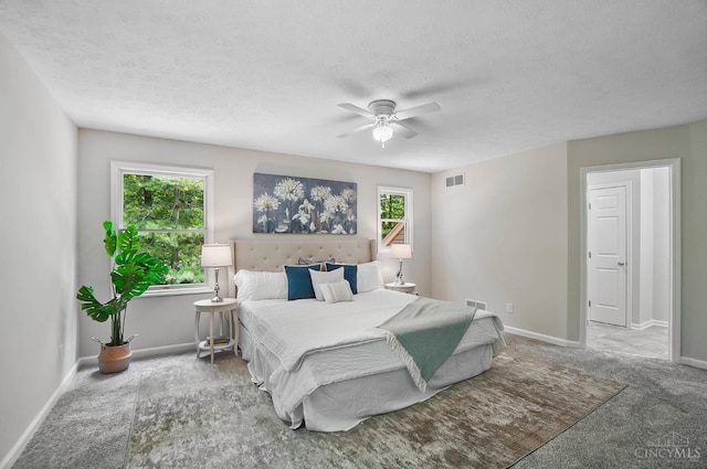 2193 Phillips Rd, Union Twp, OH 45036 - carpeted bedroom featuring a textured ceiling and a ceiling fan