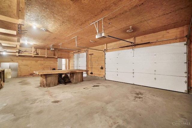 2193 Phillips Rd, Union Twp, OH 45036 - garage with a garage door opener and wooden walls