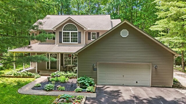 2193 Phillips Rd, Union Twp, OH 45036 - view of front of house featuring asphalt driveway and a shingled roof