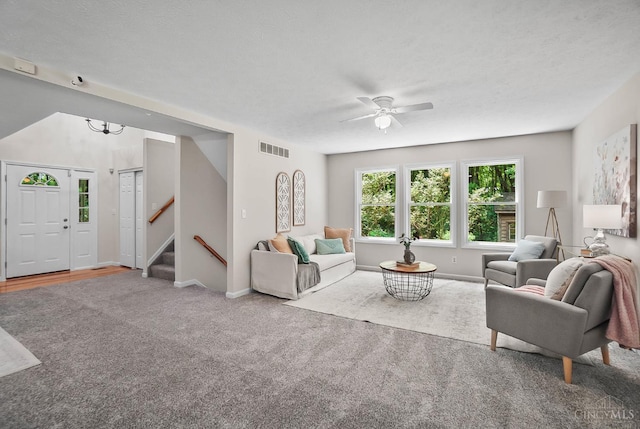 2193 Phillips Rd, Union Twp, OH 45036 - carpeted living room featuring stairs and ceiling fan