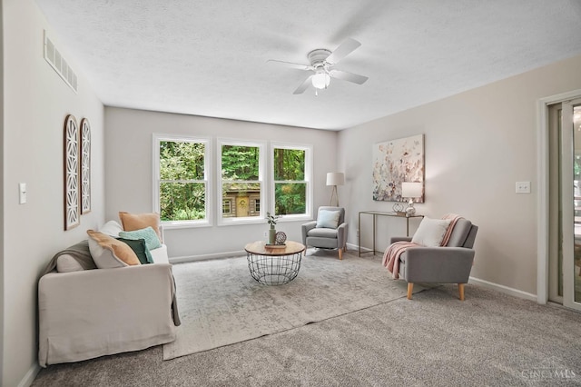 2193 Phillips Rd, Union Twp, OH 45036 - carpeted living area with a ceiling fan and baseboards