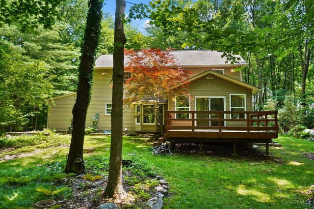 2193 Phillips Rd, Union Twp, OH 45036 - rear view of property with a deck and a lawn