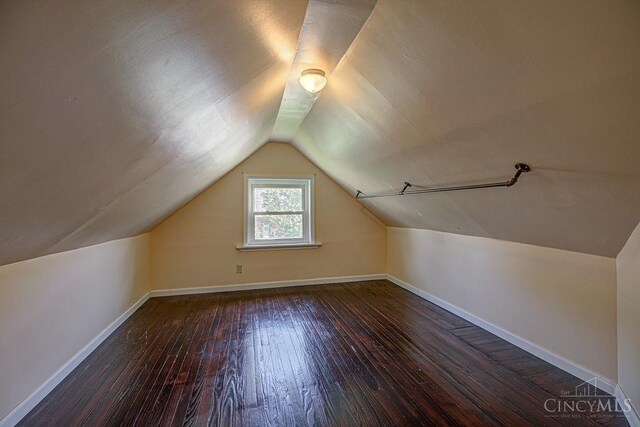 3947 Ruth Ln, Cheviot, OH 45211 - additional living space featuring wood-type flooring and vaulted ceiling