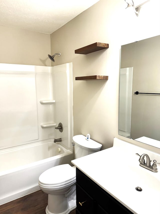 4572 Saddlecloth Ct, Batavia Twp, OH 45103 - full bathroom with vanity, bathtub / shower combination, toilet, and wood finished floors