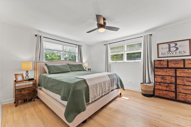 6530 Cliff Ridge Ln, Columbia Twp, OH 45213 - bedroom with light wood finished floors, baseboards, and a ceiling fan