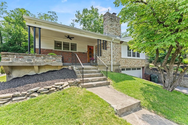 6530 Cliff Ridge Ln, Columbia Twp, OH 45213 - view of front facade with a chimney, a front yard, a garage, covered porch, and ceiling fan