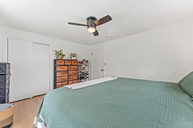 6530 Cliff Ridge Ln, Columbia Twp, OH 45213 - bedroom featuring wood finished floors, a closet, and ceiling fan