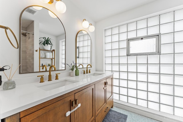 6530 Cliff Ridge Ln, Columbia Twp, OH 45213 - full bathroom featuring double vanity, a shower, and healthy amount of natural light