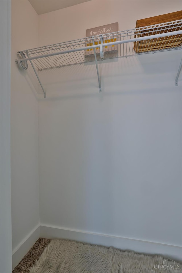 2351 Concord St, Cincinnati, OH 45206 - walk in closet featuring carpet flooring
