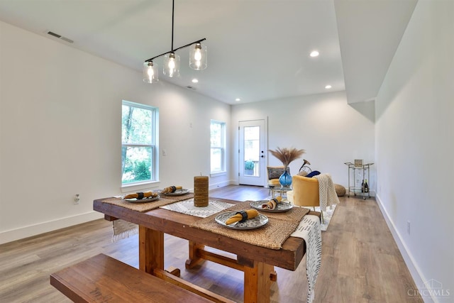2351 Concord St, Cincinnati, OH 45206 - dining room with light wood-style flooring and recessed lighting