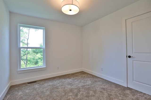 2351 Concord St, Cincinnati, OH 45206 - empty room featuring healthy amount of natural light and carpet flooring