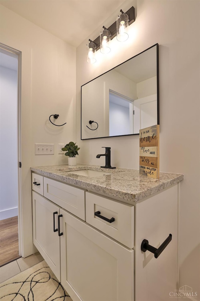 2351 Concord St, Cincinnati, OH 45206 - bathroom featuring vanity and tile patterned floors