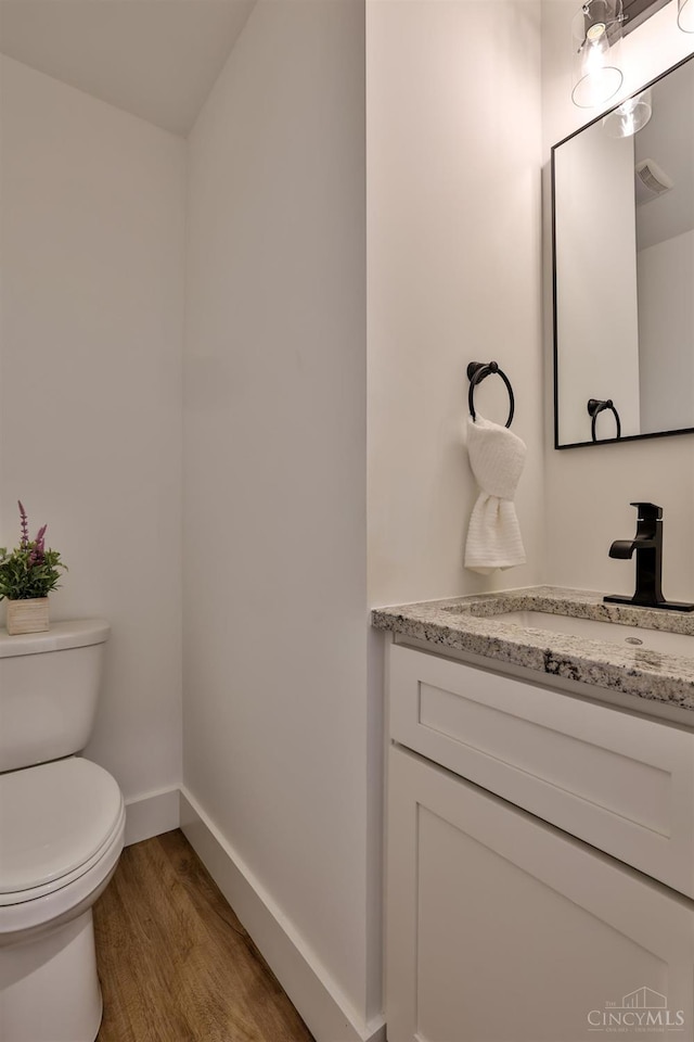 2351 Concord St, Cincinnati, OH 45206 - bathroom with wood finished floors and vanity