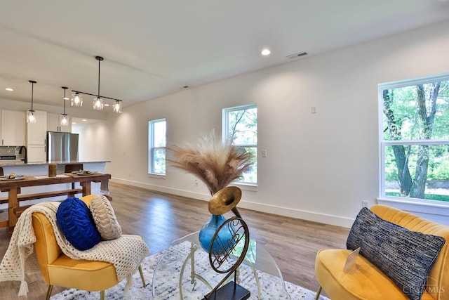 2351 Concord St, Cincinnati, OH 45206 - living room with recessed lighting and light wood-style floors