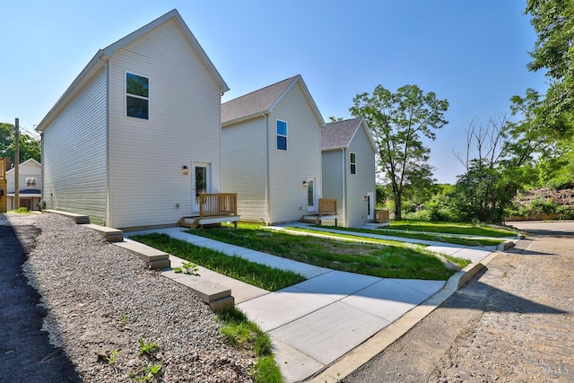 2355 Concord St, Cincinnati, OH 45206 - view of home's exterior featuring a lawn